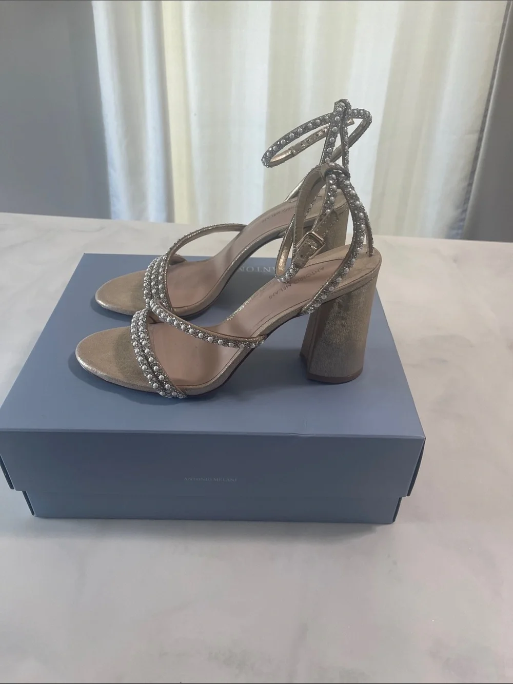 ANTONIO MELANI glittering gold